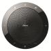 The image depicts a sleek, black Jabra conference telephone, specifically the 510 UC portable conference speakerphone. The device features a built-in speaker and microphone, with simple buttons and controls for easy use during virtual meetings. A logo can be seen on the top of the device.