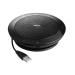 The photo shows a sleek Jabra Conference Telephone, specifically the Jabra 510 UC Portable Conference Speakerphone. The device is compact and easily portable with a circular base and a microphone in the center. The top has control buttons and indicator lights for easy operation. The speakerphone is compatible with various devices, making it a convenient choice for conference calls.