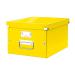 This picture features a bright yellow Leitz Click & Store Collapsible Storage Box with a medium size perfect for A4 documents. The box is neatly folded and secured with the innovative click system, making it easy to store and transport. The label holder and reinforced corners add durability to this sleek and functional storage solution.