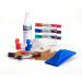 The photo shows a set of Nobo drywipe accessories, including four markers, an eraser, refill cartridges, absorbent cloths, a 125ml cleaning spray, and magnets. The accessories are designed for use with a Nobo whiteboard. The markers come in various bright colors and the eraser is a rectangular shape. The refill cartridges are small and fit easily into the markers. The absorbent cloths are made of a soft material and the cleaning spray bottle is labeled with the Nobo logo. The magnets appear to be small and round, with a magnetic backing.