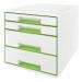 An aesthetically pleasing photograph of a Leitz WOW CUBE Drawer Cabinet is shown with its four drawers, two big and two small, opened to reveal its spacious interior. The cabinet is designed to hold A4 Maxi size documents and is colored in a refreshing white and green combination.