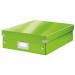The photograph shows a vibrant green Leitz WOW Click & Store Medium Organiser Box, from the brands Storage Boxes line. The box is neatly organized and closed, showcasing its convenient design and durable construction.