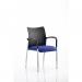 A dynamic visitor is seen at the Visitors Academy, confidently sitting on a nylon back bespoke color seat in the vibrant shade of stevia blue. Their arms rest comfortably on the armrests, showcasing a relaxed posture. The sleek design of the seat adds a touch of sophistication to the space.