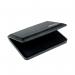 The picture shows a black COLOP stamp pad with the words COLOP MICRO 2 printed on it. It appears to be compact in size and has a smooth and matte texture. The pad is surrounded by a plastic casing with the COLOP logo on it.