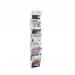 The photograph shows a sleek and modern Alba wall mounted literature display unit. It features 7 spacious compartments, perfect for organizing A4-sized documents. The unit is made of silver grey material, giving it a sophisticated look.