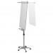 The photo shows a sleek silver magnetic flipchart easel with extension arms, measuring 700x745mm. The easel is mounted on a clean, mobile stand and features the brand name Nobo Classic Nano on the top. The top of the easel is magnetic, making it easy to attach paper or display materials. The arms can be extended to hold larger flipchart pads. The overall design is modern and professional, perfect for presentations or brainstorming sessions in any office setting.