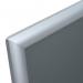 This picture features a sleek and modern Hampton Frames Literature Holder Photo Album with a CertificatePhoto Snap Frame. The frame is made of A4-sized aluminium and has a clear plastic front, giving it a professional look. The silver frame is perfect for displaying important documents and certificates.