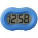 The image shows a vibrant blue Acctim Vierra alarm clock, manufactured by ACCTIM Ltd. The clock has a Moroccan-inspired design and is surrounded by a selection of electrical accessories.