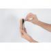 The picture shows a whiteboard eraser designed by Bi-Silque for use with their magnetic whiteboards. The eraser has a rectangular shape and features a combination of cork and magnetic materials. The cork surface is natural in color and adds a earthy, organic touch to the eraser. On the top of the eraser, there is a strip of white plastic material that serves as a handle for easy grip and maneuvering. The eraser is compact in size and would make a convenient addition to any whiteboard setup.