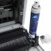 In the photo, you can see a 100ml spray bottle of AF International Whiteboard Cleaning AF Platenclene Print Roller Cleaning Pump, with the label clearly displaying the product name and size. The bottle is designed with a sleek white and blue color scheme and has a pump spray feature for easy application. The product is specifically designed for keeping whiteboards and print rollers clean and free from smudges and dirt.