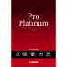 This photo shows a stack of glossy photo paper in size A3, made by Canon. The pack contains 20 sheets and the product name is PT-101. The sheets are neatly stacked and have a smooth, shiny surface. The packaging is white and red with the Canon logo prominently displayed.