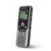 This photo features a compact Philips Dictation Philips DVT1250 Digital Voice Tracer 28585J, with a sleek silver and black design. The device has a clear, backlit display and various buttons for easy control, making it perfect for capturing and storing high-quality audio recordings.