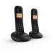 This image features two sleek, black British Telecom cordless telephones with large, easy-to-read displays. Each phone comes with a call blocker function and uses Dect technology for clear communication. The modern design and advanced features make this telephone set a convenient choice for everyday use.