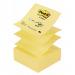 In the photo, there are several yellow Post-it notes arranged neatly on a desk or table. They are the Z-Notes variety, measuring 76x76mm. Each note has school stationery printed on it in black lettering. They are ready to be used for notes, reminders, or organization.