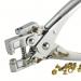 In the image, there is a set of filing accessories from ACCO Brands. The main items featured are a Rexel eyeletter and punch, both in a sleek chrome finish. The eyeletter has the brand name visible on the side and the punch has a sharp, pointed edge. Each tool appears to be of high quality and suitable for use in an office or home setting. The accessories also include small silver fasteners and a clear plastic storage container for organization. The overall aesthetic is professional and functional.
